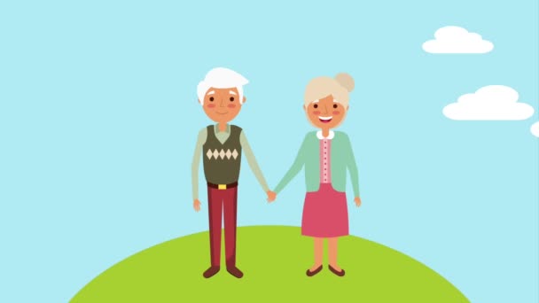 Nettes älteres Paar hält Händchen im Park — Stockvideo