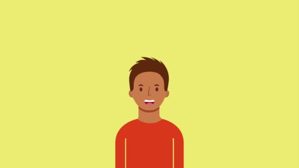 Porträt junger Mann in orangefarbenem Pullover — Stockvideo