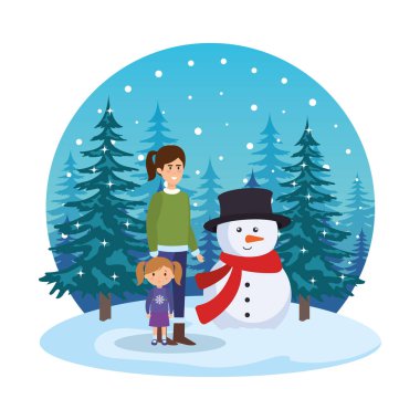 Anne ve kızı ile kardan adam çimen