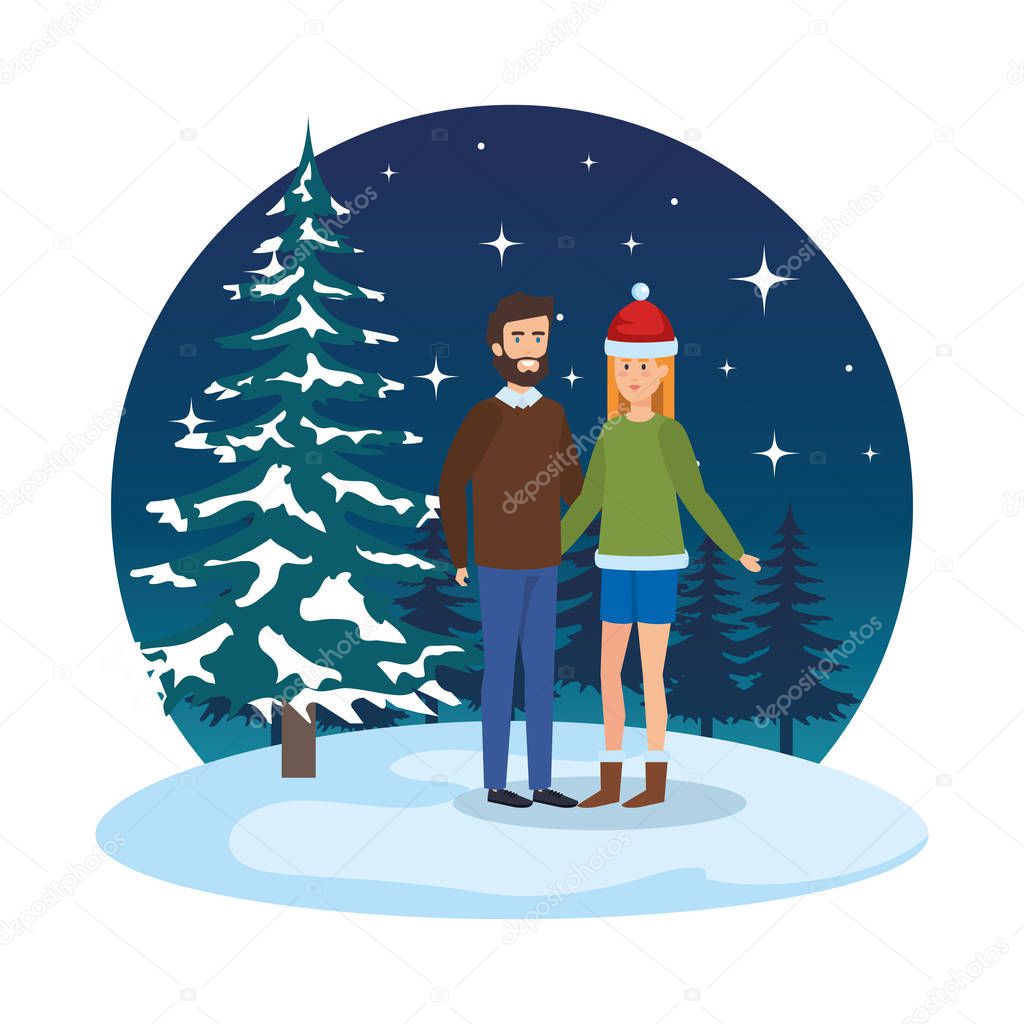 young couple with winter clothes in snowscape