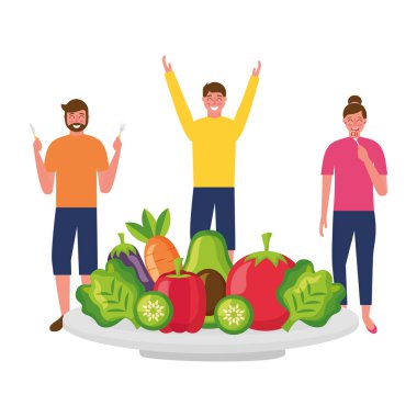 Erkek ve kadın tabakta sebze ile