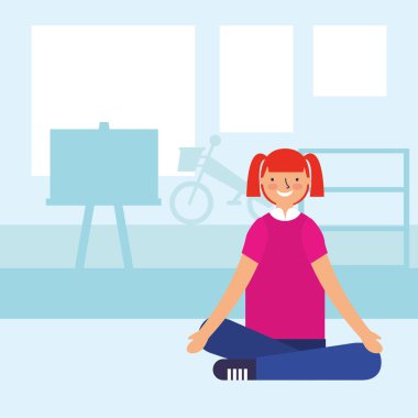 Genç sınıfta oturuyor