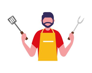 adam holding çatal ve spatula