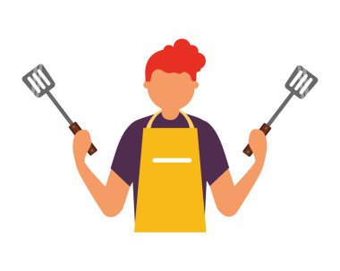 Adam tutarak iki spatula mutfak eşyaları