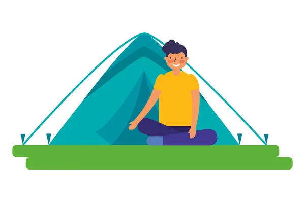 Chłopiec siedzi skrzyżowanymi nogami z namiot camping — Wektor stockowy