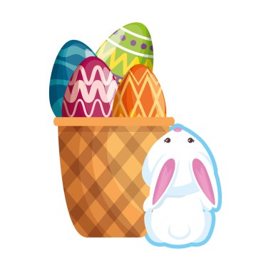 Paskalya yumurtaları ile sevimli tavşan sepet içinde boyalı