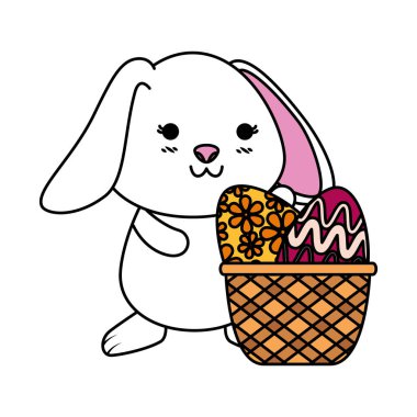 Paskalya yumurtaları ile sevimli tavşan sepet içinde boyalı