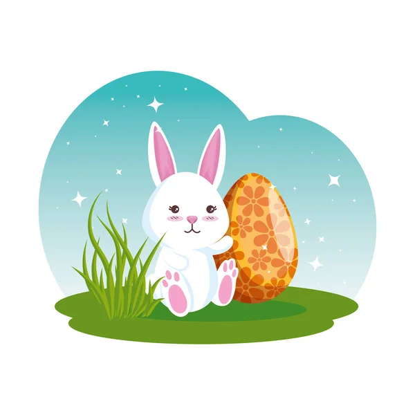 Cute rabbit with easter egg painted in the meadow — Stock Vector