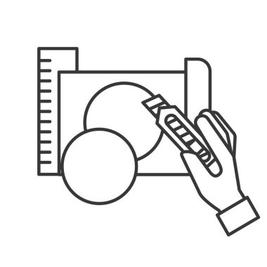 kağıt ile daire yapma kesici tutan el