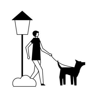 ile onun köpek parkta yürüyen adam