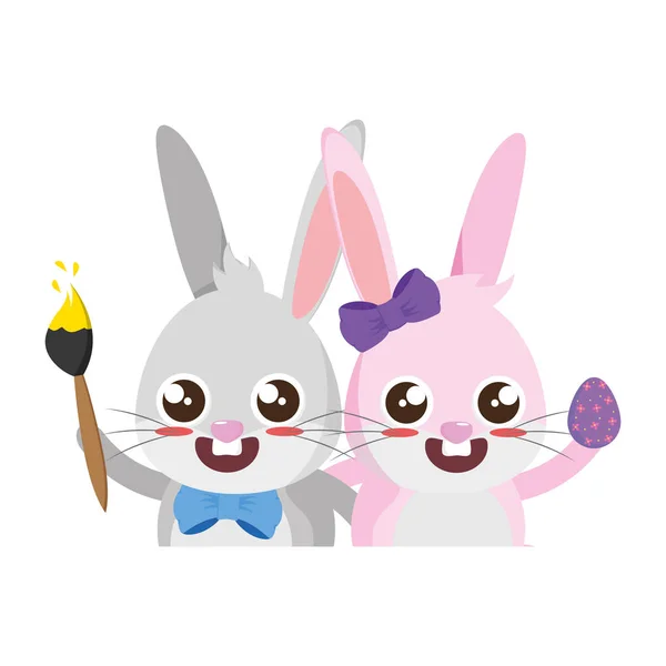 Belo casal de coelhos com ovo e pincel —  Vetores de Stock