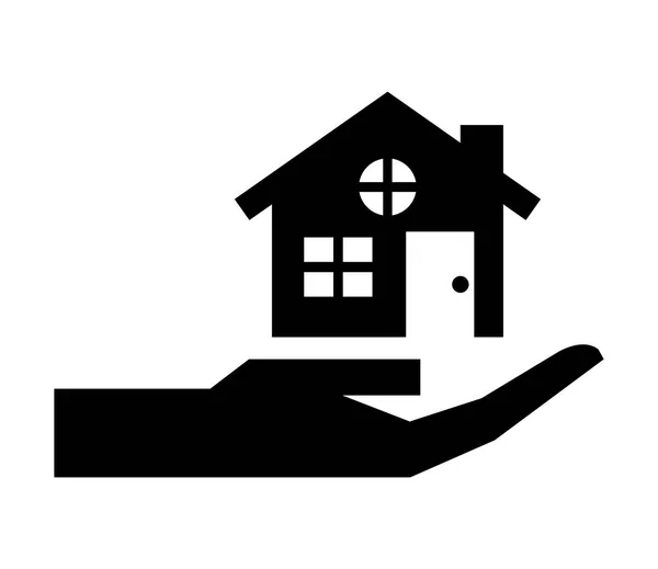 Hand with house building silhouette icon — Stock Vector