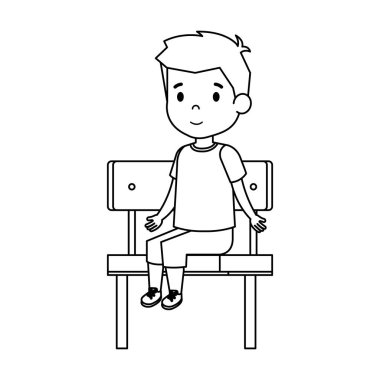 schoolchair içinde oturan sevimli küçük çocuk