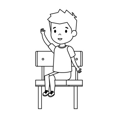 schoolchair içinde oturan sevimli küçük çocuk