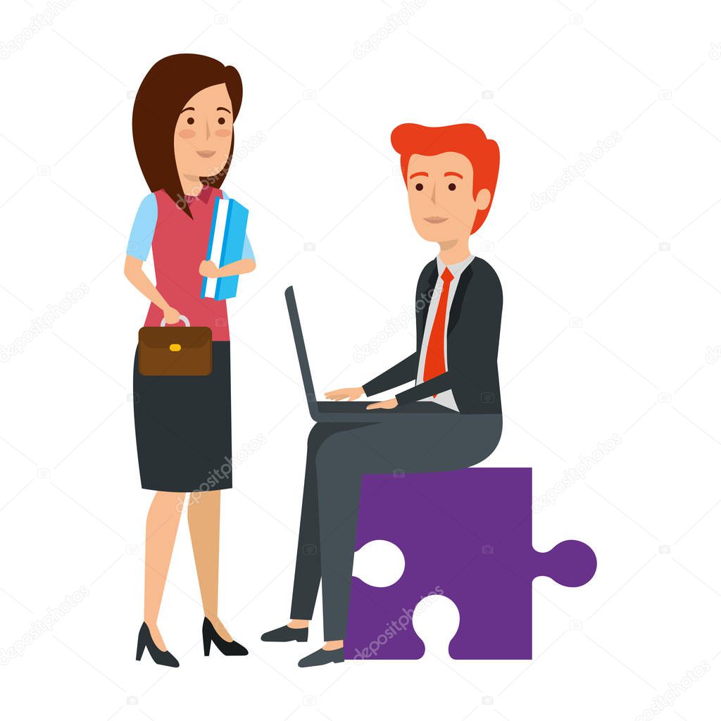 business couple sitting in puzzle piece with laptop