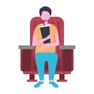 sinema koltuğunda oturan adam film izlerken