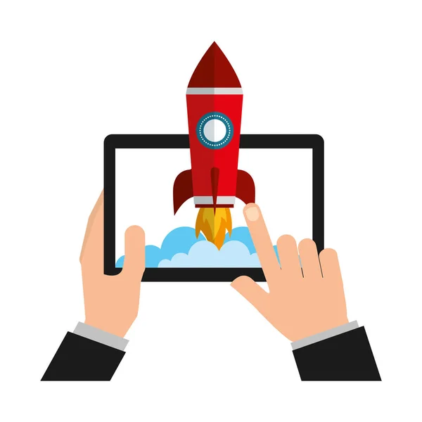 hands with tablet device and startup rocket