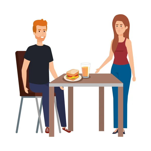 Jeune couple manger dans des personnages de table — Image vectorielle