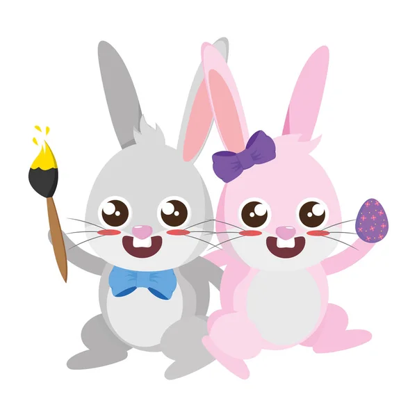 Vackra kaniner par med ägg och pensel — Stock vektor