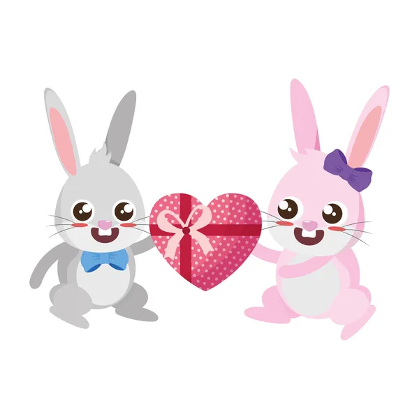 Beautiful rabbits couple with heart gift easter characters — Stock Vector