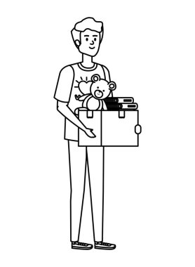 Genç adam bağış kutusunu kaldırmaya gönüllü.