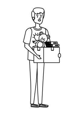 Genç adam bağış kutusunu kaldırmaya gönüllü.