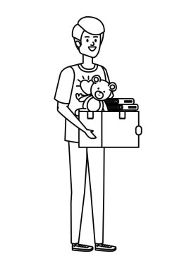 Genç adam bağış kutusunu kaldırmaya gönüllü.