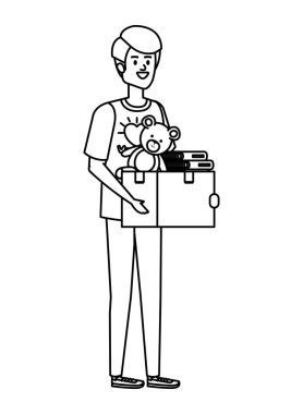 Genç adam bağış kutusunu kaldırmaya gönüllü.