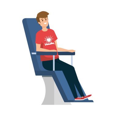 Genç adam bağış koltuğunda gönüllü.