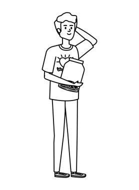 Gönüllü genç adam kavanozda madeni para bağışlıyor.