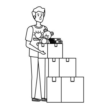 Genç adam bağış kutularıyla gönüllü oldu.