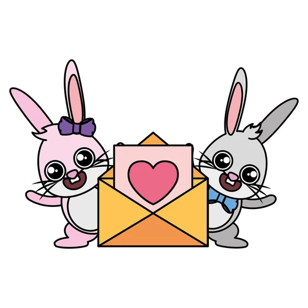 Beautiful rabbits couple with heart envelope — Stock Vector