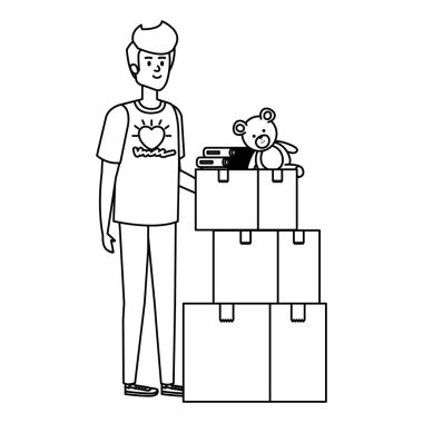 Genç adam bağış kutularıyla gönüllü oldu.