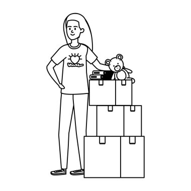 Bağış kutularıyla gönüllü genç bir kadın.