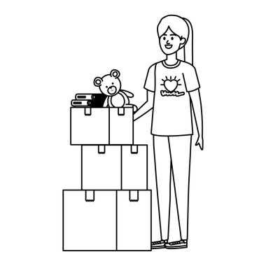 Bağış kutularıyla gönüllü genç bir kadın.