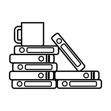 kitap yığılmış ve kahve fincanı