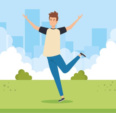 mutlu adam çalılar ile parkta atlama