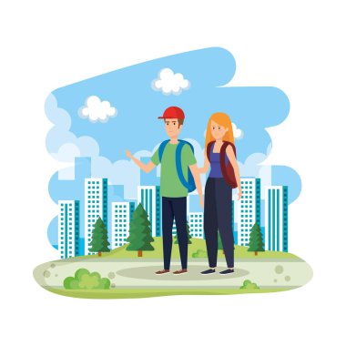 Okul çantalı genç çift manzarada