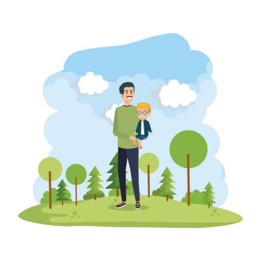 Park sahnesinde oğlu olan genç bir baba.