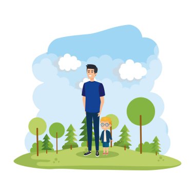 Park sahnesinde oğlu olan genç bir baba.