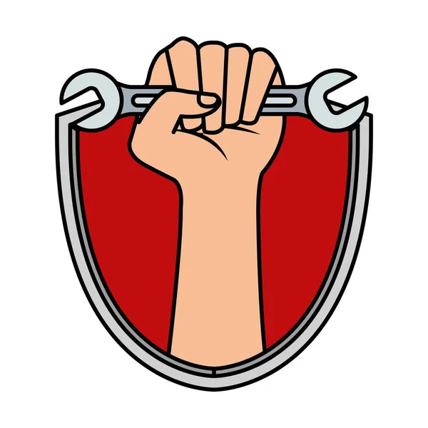 Mano con llave inglesa en escudo — Vector de stock