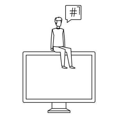 Genç adam konuşma baloncuğuyla bilgisayarda oturuyor.