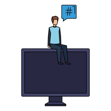 Genç adam konuşma baloncuğuyla bilgisayarda oturuyor.