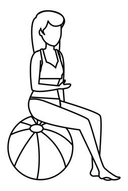 balon oturmuş mayo ile güzel kadın