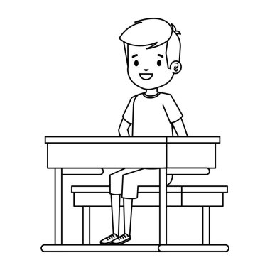 okul masasında oturan mutlu küçük öğrenci çocuk