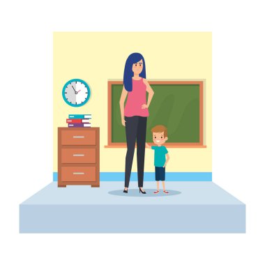 okul sınıfında kadın öğretmen ve küçük çocuk