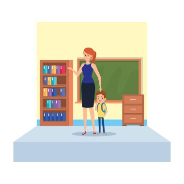 okul sınıfında kadın öğretmen ve küçük çocuk