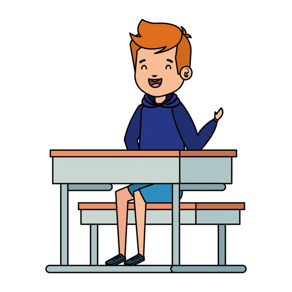 Pequeno estudante feliz menino sentado na mesa da escola — Vetor de Stock