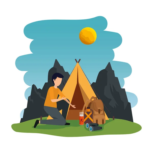 Young man in the camping zone — Stock Vector