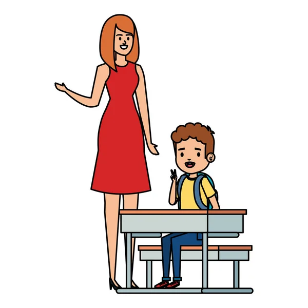 Student boy seated in school desk with female teacher — Stock Vector